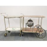 Two 1950's/60's tea trolleys together with a WMF fondue set, tallest H. 82cm.