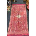 A fine Indian pink Paisley silk and wool mix shawl 100 x 220cm.
