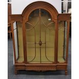An attractive mid 20th Century kingwood veneered arch top display cabinet, L.145cm , W.107cm.