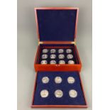 A case of 18 silver RAF commemorative coins.