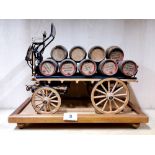 An old handmade wooden advertising model of a dray cart for Young's Brewery London, W. 39cm, H.