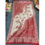 A fine Indian red Paisley silk and wool mix shawl 100 x 220cm.