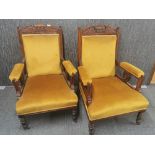 A pair of Victorian carved mahogany armchairs, H. 100cm. Matching lots 305 and 360.