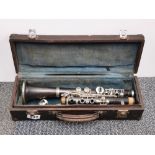 A cased rosewood clarinet.