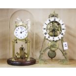A 19th century part skeleton clock movement, H. 29cm. Together with a torsion clock under dome.