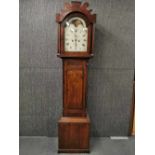 An oak cased eight day English long cased clock with moon dial by Stubington of Gosport. The rear of