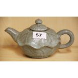 A Chinese crackled celadon glazed terracotta tea pot, spout to handle L. 20cm.