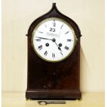A 19th century mahogany veneered striking mantle clock, H. 29cm (no pendulum).