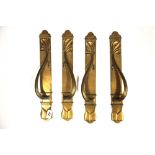 A set of four original bronzed metal door handles L. 40cm.