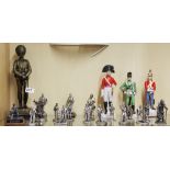 A bronze figure of a soldier, H. 33cm. Together with a group of mixed metal figures and three