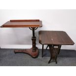 An Edwardian inlaid pembroke table and an over bed Victorian mahogany table. tallest H. 101cm.