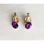 A pair of 925 silver gilt earrings set with oval cut amethyst and sapphires, L. 2.8cm.