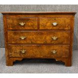 A 19th Century burr walnut, mahogany and mahogany veneered chest of drawers, W. 105cm H. 81cm.