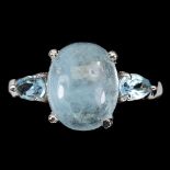 A matching 925 silver ring set with a cabochon cut aquamarine, (P.5).