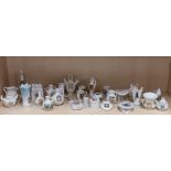 A quantity of crested ware items.