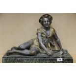 An original Art Deco cold painted spelter figure on a marble base, L. 52cm, H. 35cm.