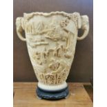 A large Chinese old moulded resin copy of an ivory vase, H. 32cm.