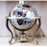 A mother of pearl and semi precious stone inlayed globe, H. 37cm.