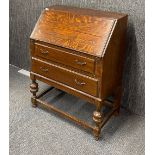 A 1930's drop front bureau, W. 74cm H. 97cm.