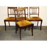 A set of four Regency style mahogany dining chairs.