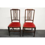 A pair of pretty Edwardian inlaid bedroom chairs.