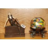 An Art Deco style figurine, H. 21cm. Together with a bronze frogs candle holder.