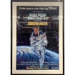 A framed James Bond 007 Moonraker film poster. Advance 1 sheet A.