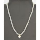 A single strand necklace of silver and faceted aquamarine, necklace L. 40cm