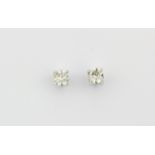 A pair of 18ct white gold diamond set stud earrings, approx. 0.88ct overall.