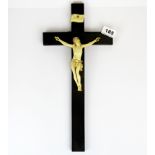 A 19th Century carved ivory and wood crucifix, H. 41cm.