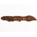 A interesting Chinese carved hard wooden model of a writing brush with dragon handle. L. 27cm.