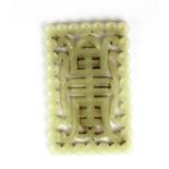 A Chinese carved mutton fat jade double sided character amulet, 8.5 x 5.5 x 0.4cm.