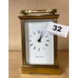 A Mappin & Webb gilt brass carriage clock, H. 15cm.