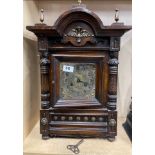 A Victorian silver-gilt dial wooden mantel clock with striking movement, H. 53cm.