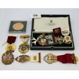 A group of gilt base metal Masonic medals and other items, including a Royal Flying Corps cap