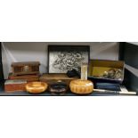 A group of wooden boxes and other items.