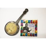 A signed George Formby ukulele banjo and record.