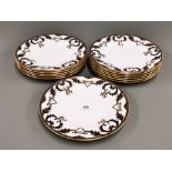 A set of 12 fine Royal Crown Derby 'Majesty' pattern hand painted and gilt plates, Dia. 27cm.