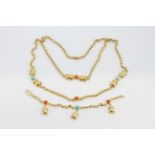 A superb 18ct yellow gold Cartier scarab design necklace and bracelet set with coral and