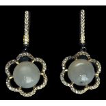 A pair of 925 silver drop earrings set with cabochon cut moonstones and white stones, L. 3.3cm.