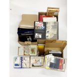 A large collection of mixed stamps and stamp albums.