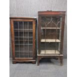A lead glazed early 20th Century oak bookcase and a mahogany display cabinet, tallest H. 129cm W.