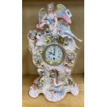 A 19th C French porcelain mantel clock, H. 46cm. (some restoration to porcelain)