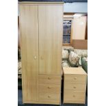A contemporary wardrobe and bedside cabinet, 76 x 193cm.