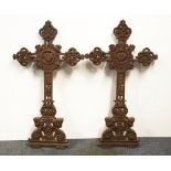 Two antique cast iron crosses, H. 84cm.