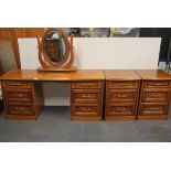 An attractive contemporary dressing table and mirror with matching bedside cabinets, W. 154cm.