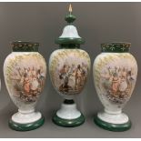A garniture of three 19th Century painted milk glass vases (one with cover), tallest 54cm.