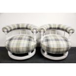 A pair of unusual re-upholstered 19th Century French circular armchairs, Dia. 68cm.