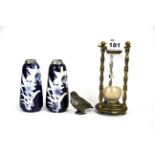 A pair of continental hallmarked silver rimmed porcelain vases, a Chinese brass egg timer and a cold