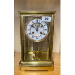 A gilt brass four glass mantel clock with mercury pendulum and striking movement, H. 27cm. Appears